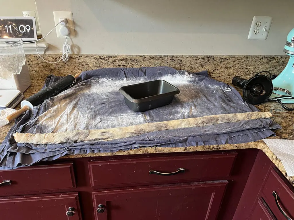 Dough rolled up with pecan filling