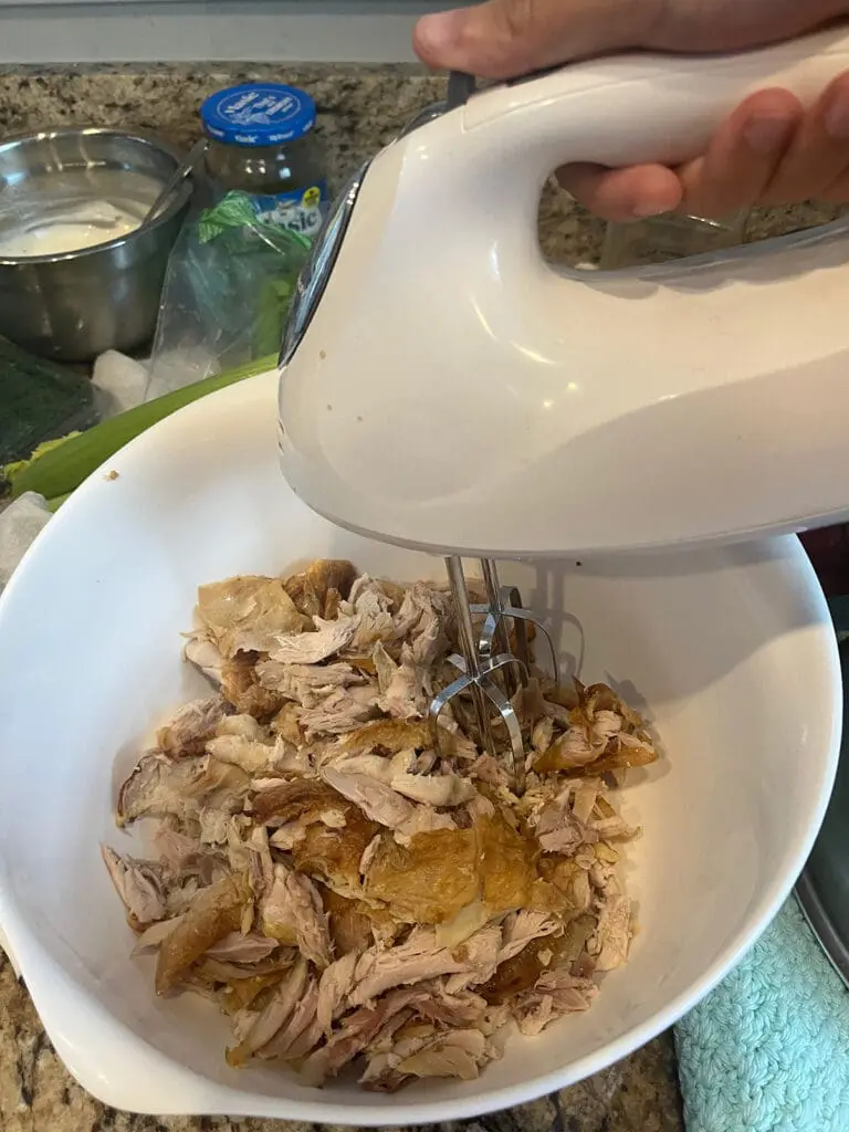 Shredding chicken with a mixer