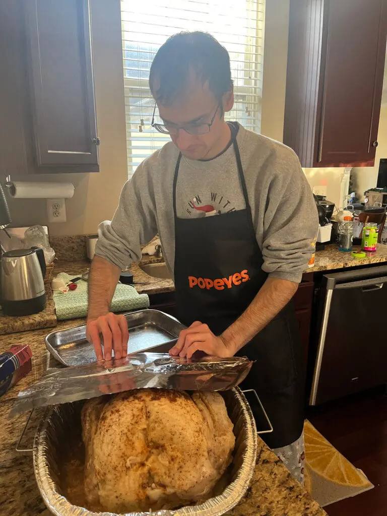 Popeyes turkey covering in foil