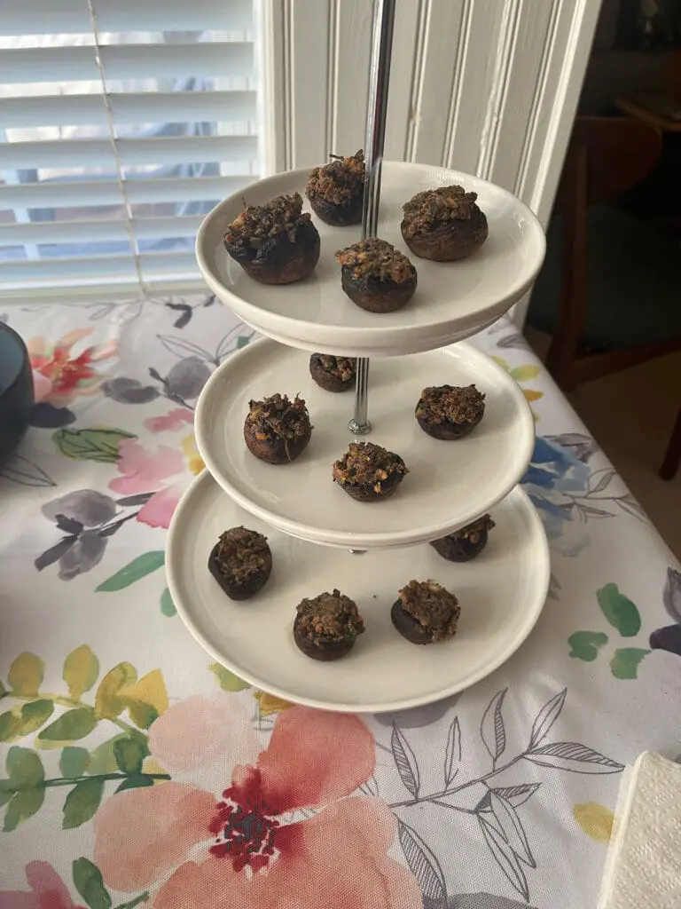 Thanksgiving Stuffed mushrooms appetizers on three tiered tray