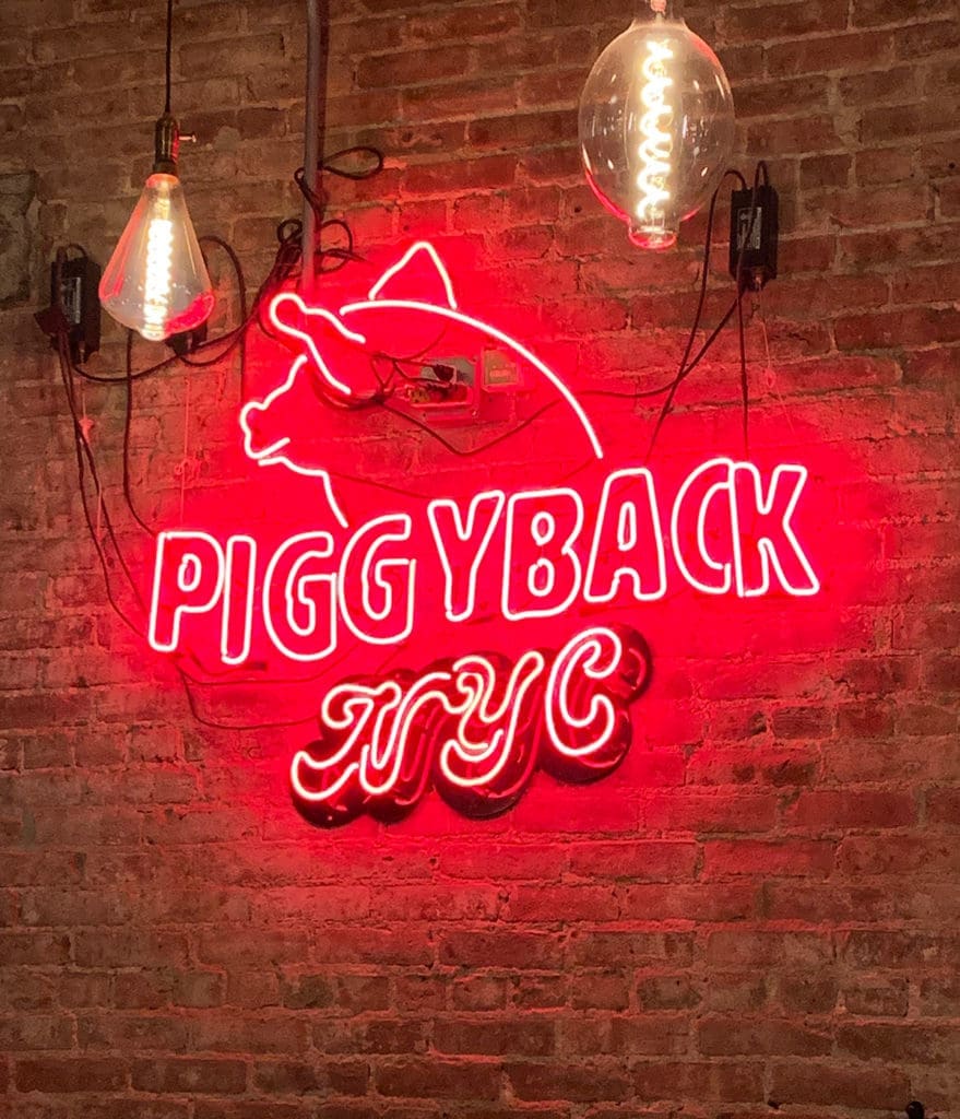 Piggyback restaurant sign