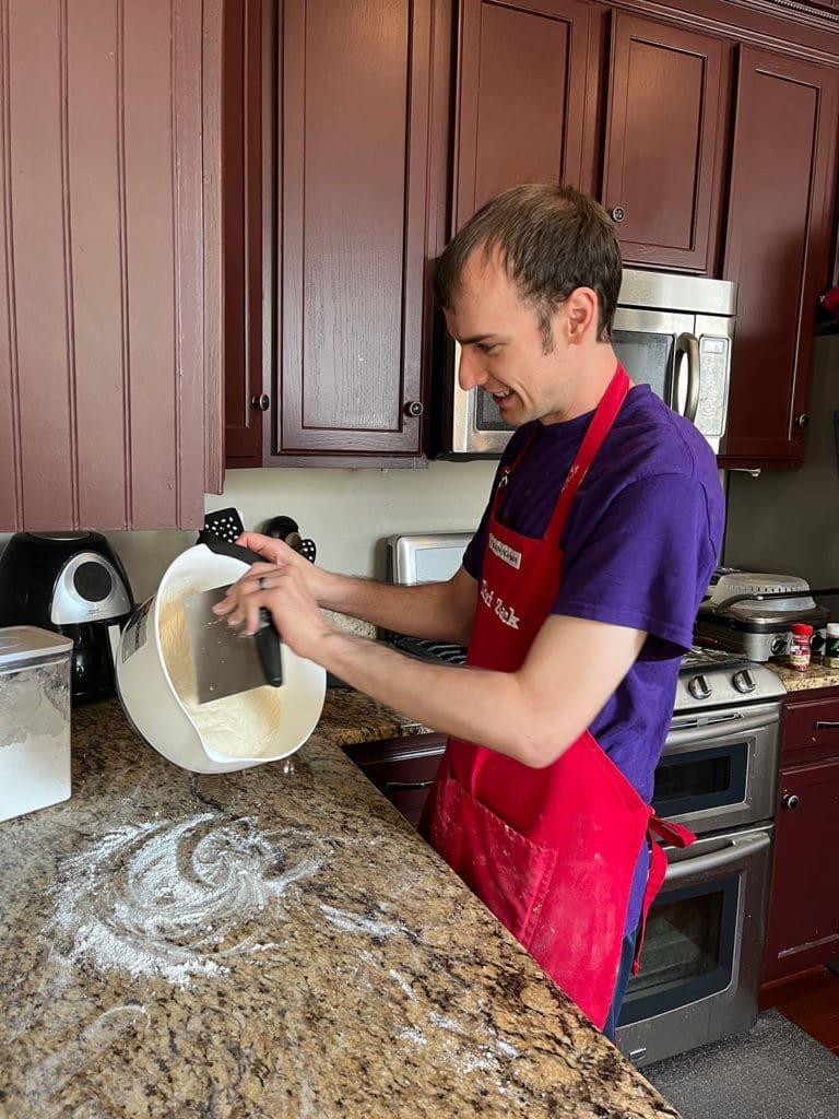 Xak using the dough scraper