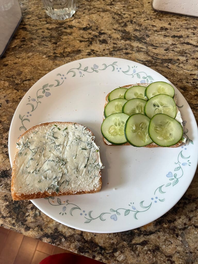 Cream cheese mixture with cucumbers on bread
