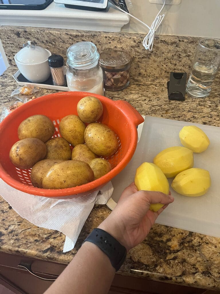 Peeling potatoes