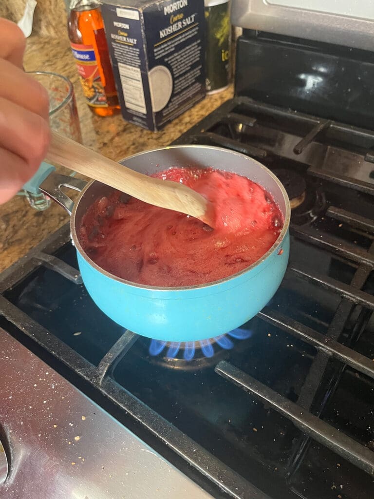 Raspberry Jam Boiling on stove