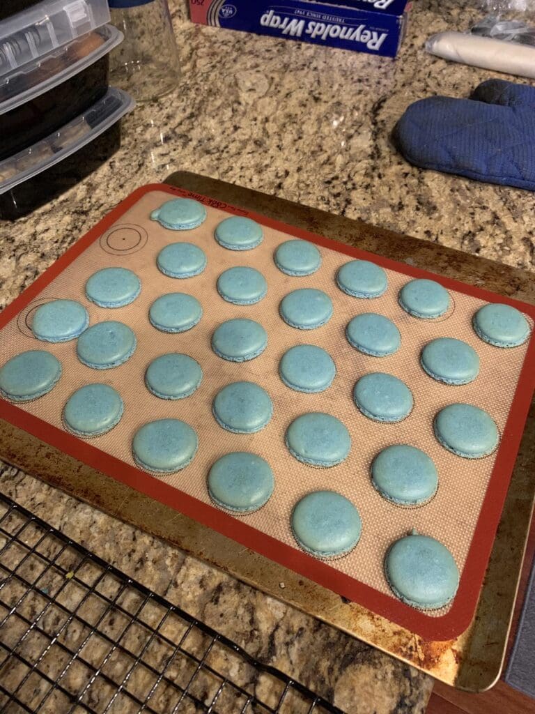 baked macarons on sheet